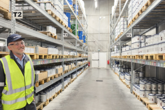 AkzoNobel employee inside the expanded aerospace coatings warehouse in France.