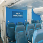 Cebu Pacific aircraft cabin with modern seating and interior branding.