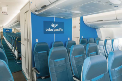 Cebu Pacific aircraft cabin with modern seating and interior branding.