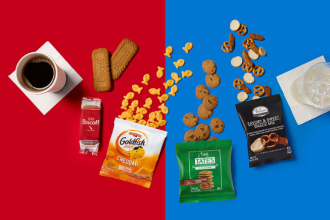 American Airlines Main Cabin snacks including cookies, Goldfish and snack mix