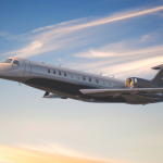 Embraer Legacy 650 business jet flying above clouds