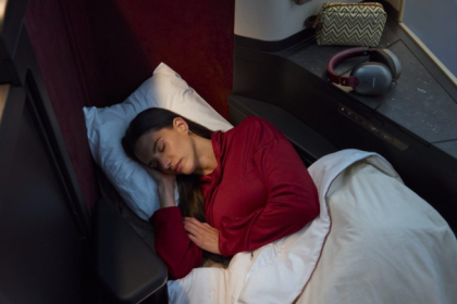 Passenger rests in a premium aircraft seat as part of Avianca and GOL INSIGNIA