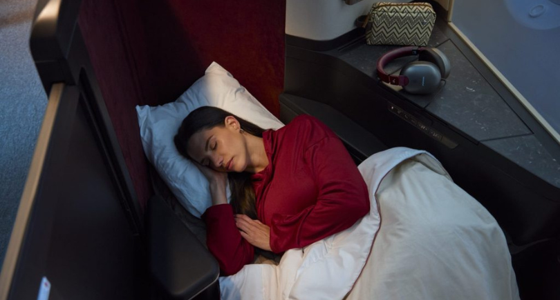Passenger rests in a premium aircraft seat as part of Avianca and GOL INSIGNIA