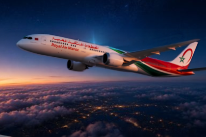 Royal Air Maroc Boeing 787 flying above clouds at sunset
